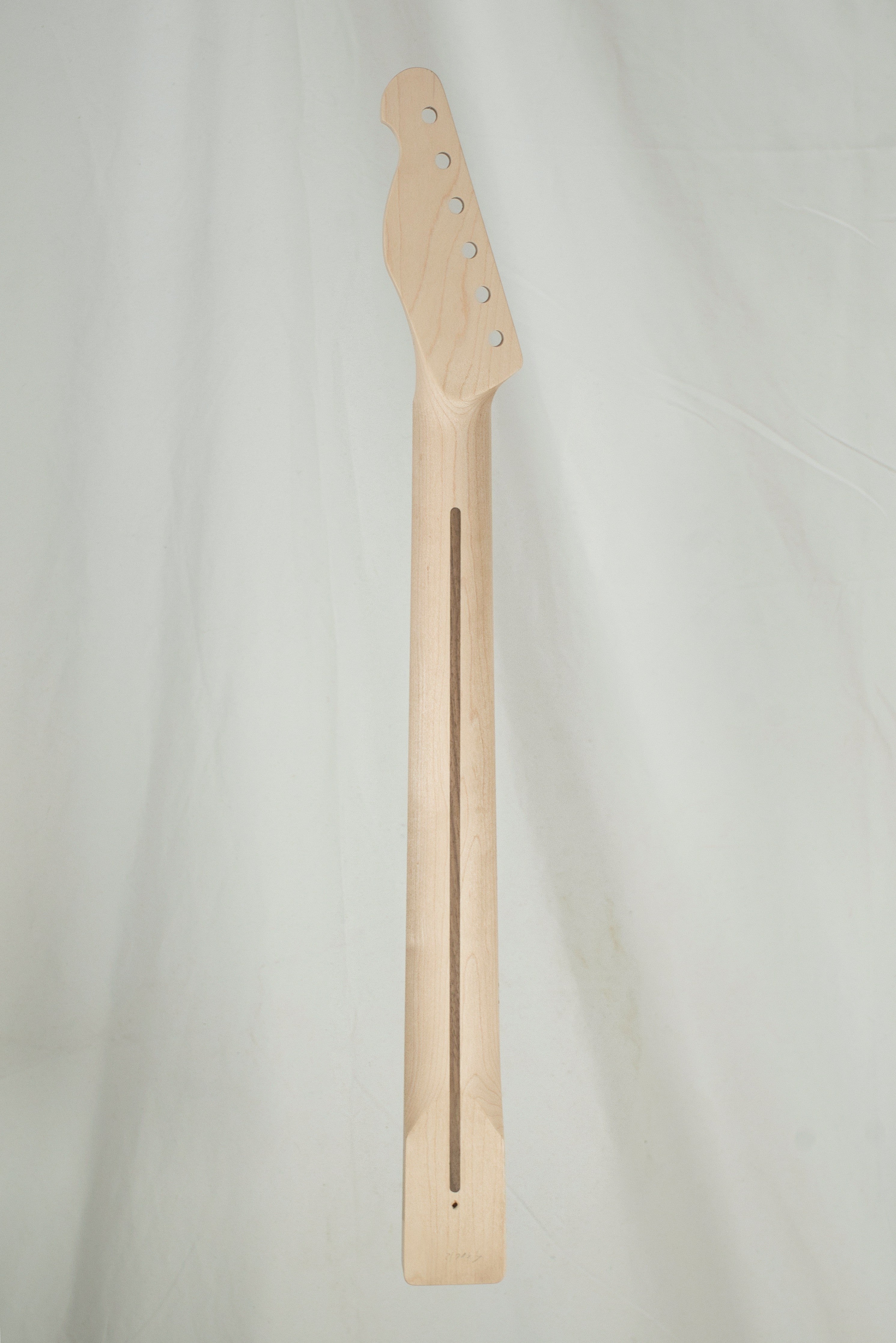 One Piece Maple T Style Neck